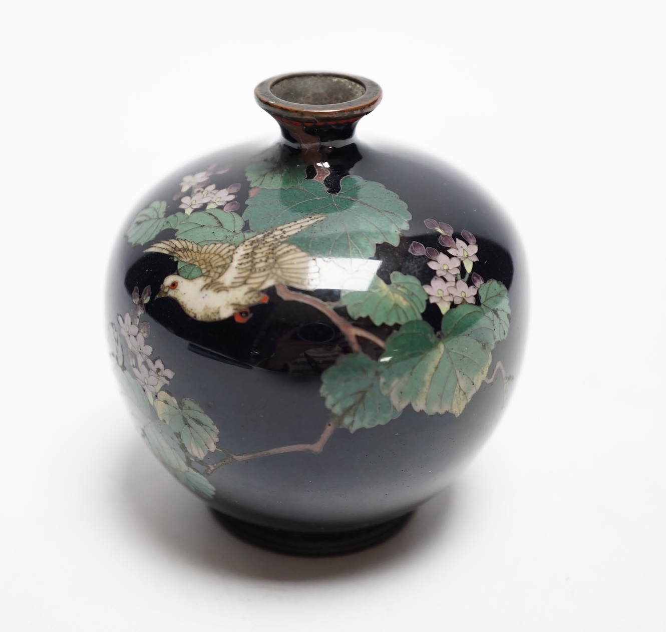 A Japanese silver wire cloisonné enamel miniature globular vase, Meiji period, decorated with a dove amid flowering branches, 6.5cm high